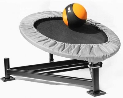 grey adjustabke trampoline with orange and black 4kg medicine ball